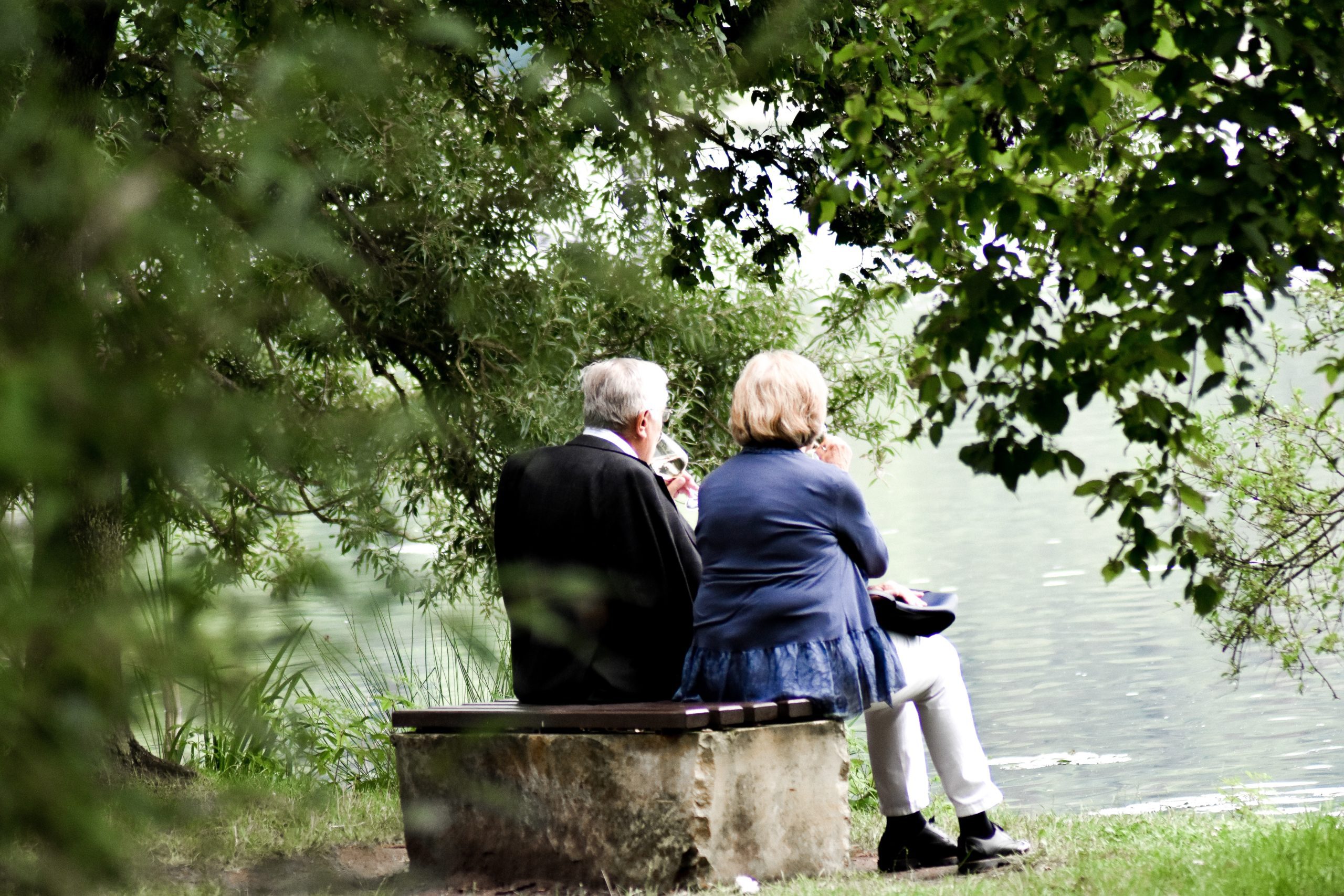 senior couple sitting outside