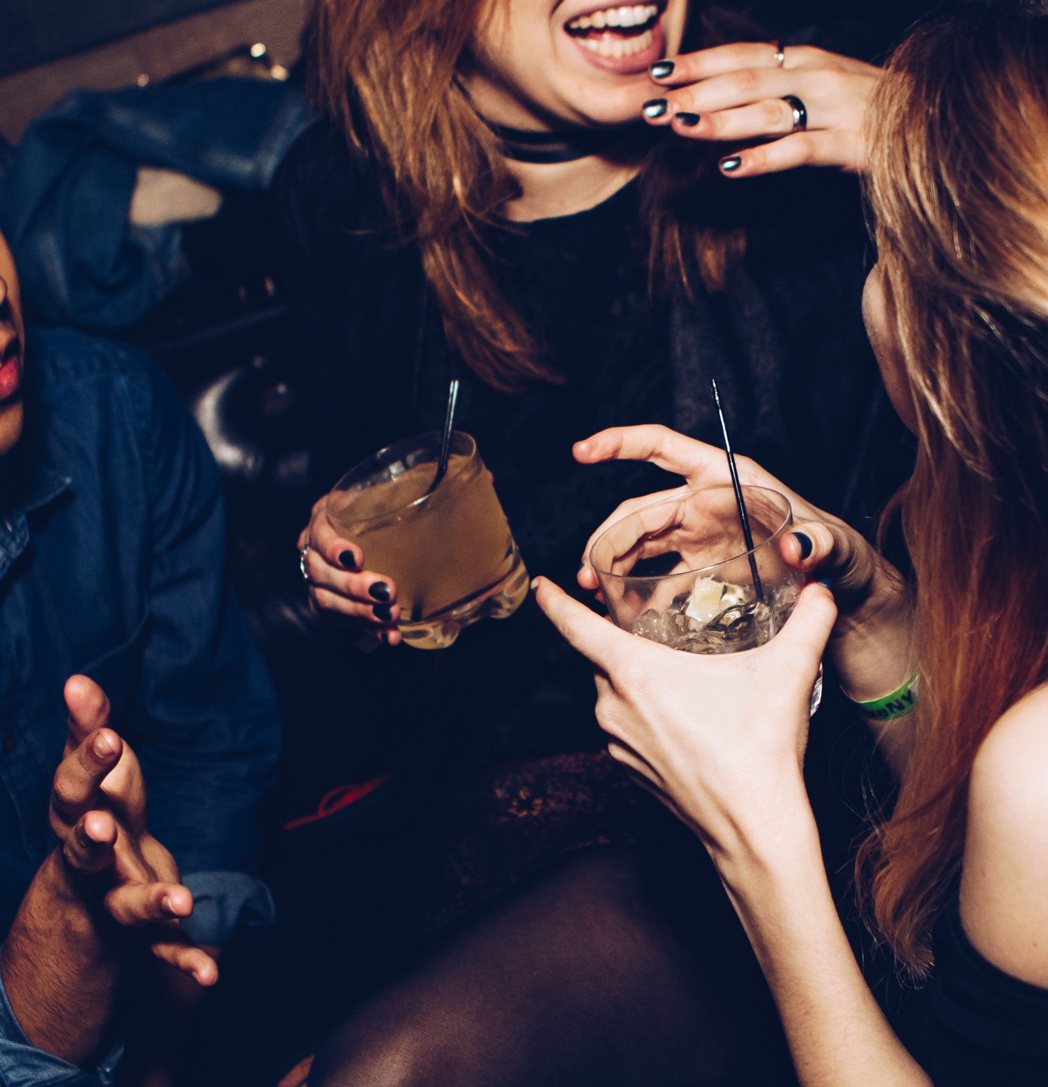 women drinking cocktails