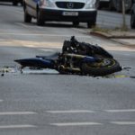 damaged motorcycle on road