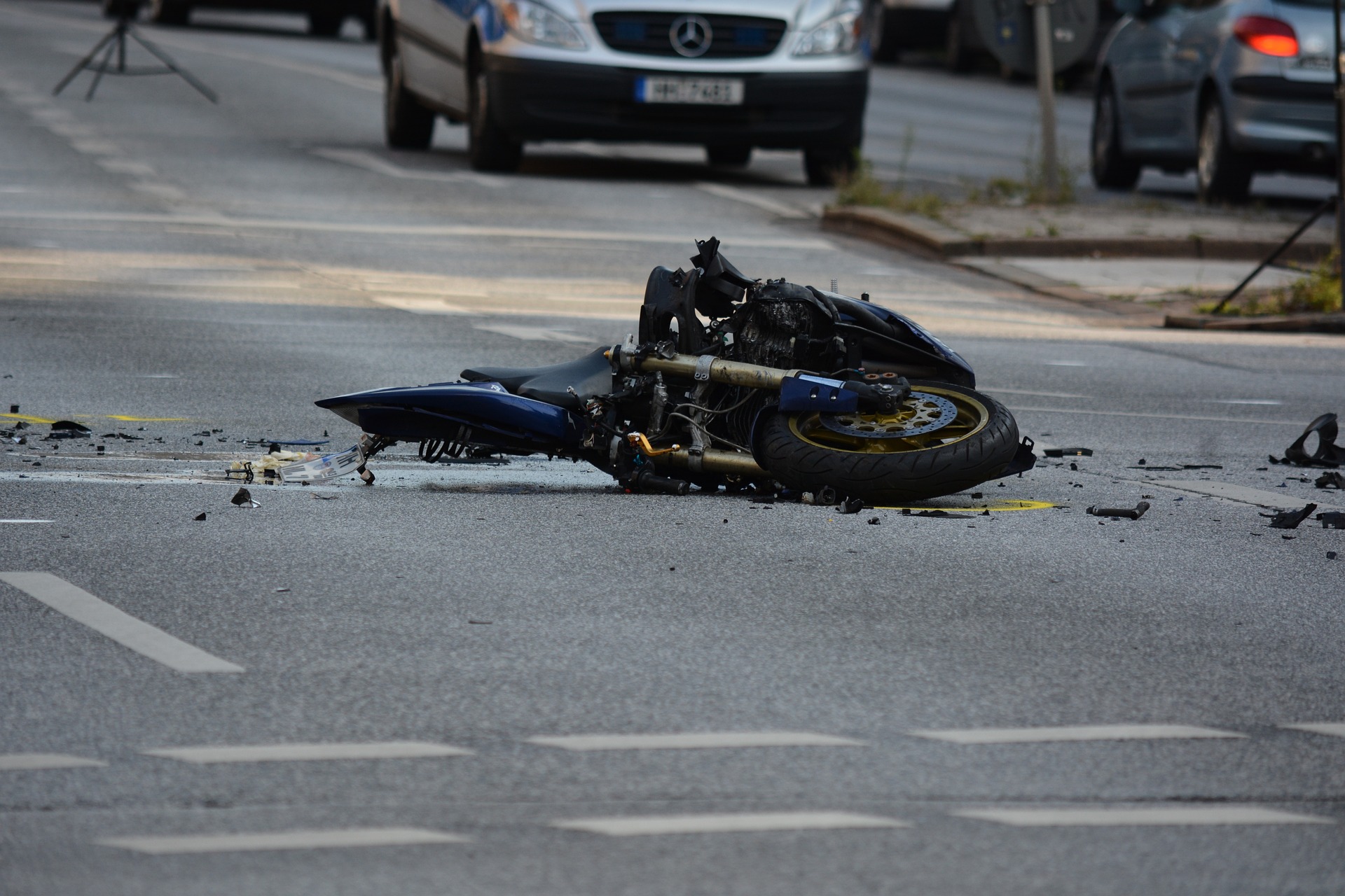 damaged motorcycle on road
