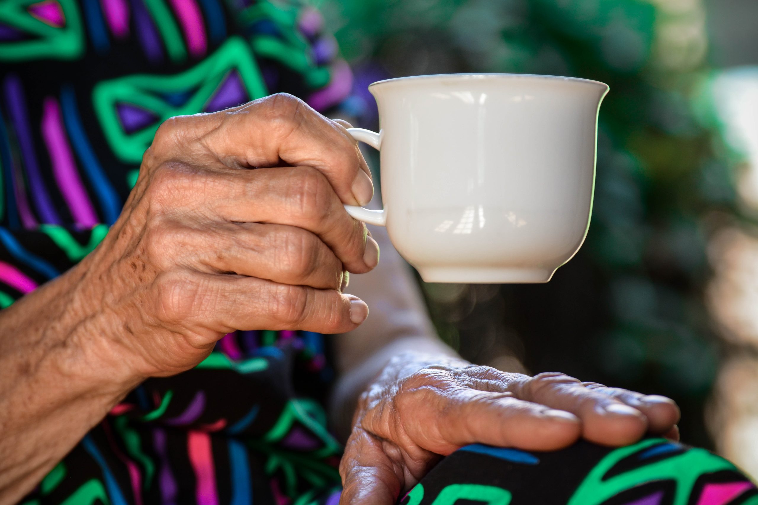 senior woman holding teacup