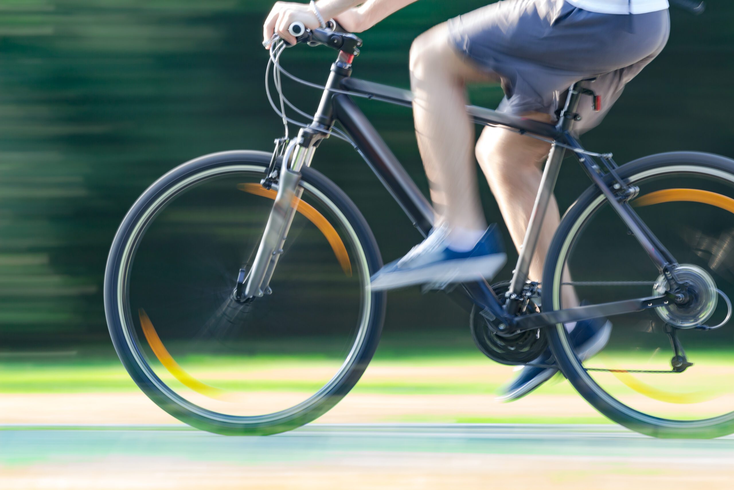 blurred cyclist riding fast