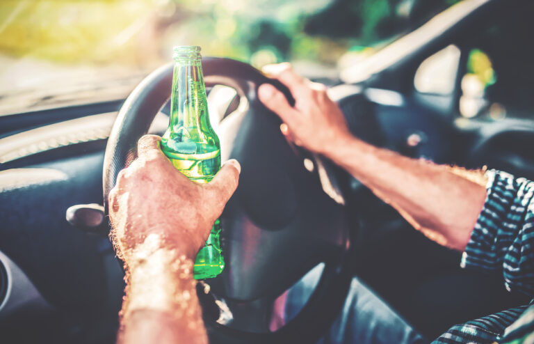 drunk driver at wheel