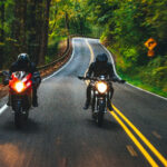 two motorcyclists on backroads