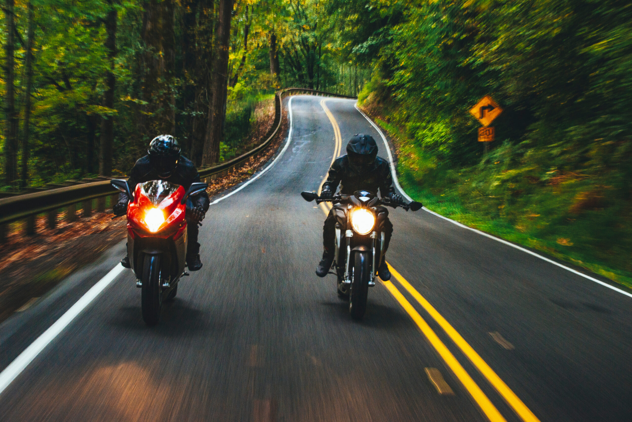 two motorcyclists on backroads